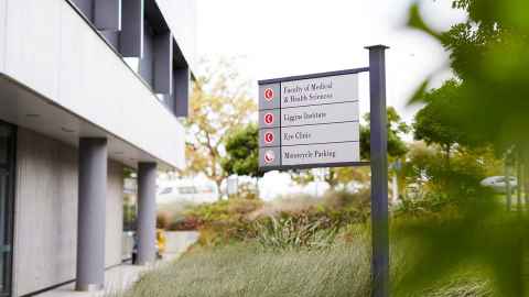 Directional sign pointing to the Liggins Institute