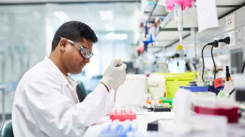 Analytical and Molecular Research Platform staff in research lab