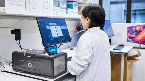 Research platform staff operating PromethION sequencing equipment