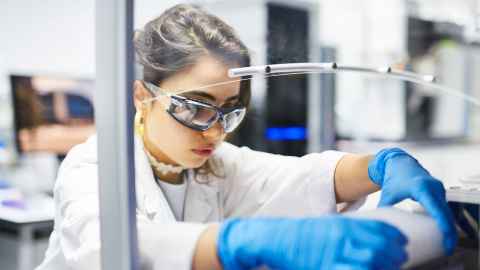 Student working in a liggins institute lab.