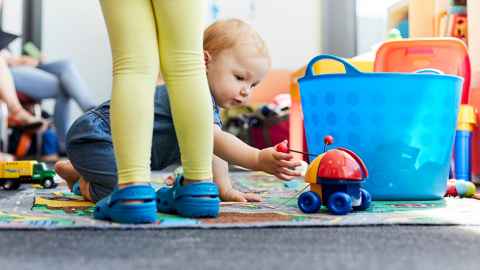 A child playing with a toy in the Liggins Institute Clinical Research Unit