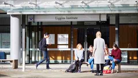 Students gathered outside the Liggins Institute building