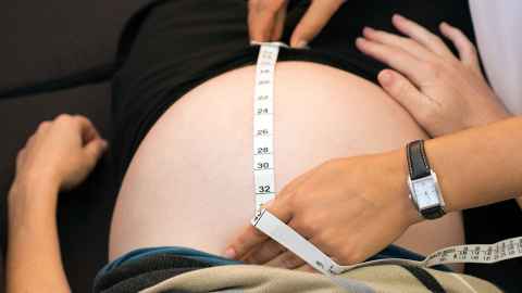 Measuring a pregnant women's belly