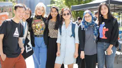 Group of happy students at the Clubs Expo.