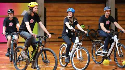 Charlotte Blythe encourages participants in a mini cycling festival in the Recreation Centre.