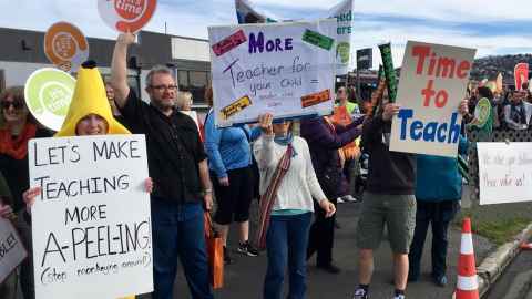 Teachers on strike with placards