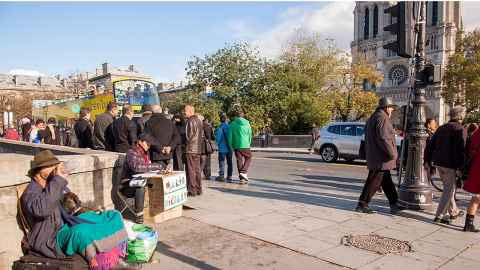 Homelessness across the road from the cathedral towers of Notre-Dame which has drawn public donations of almost €1 billion.