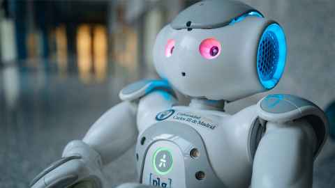 A robot with the logo of Universidad Carlos III de Madrid