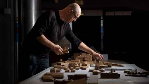 Professor Andrew Barrie preparing the models for the exhibition. 