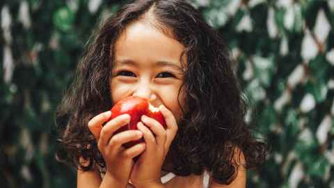 Child eating an apple