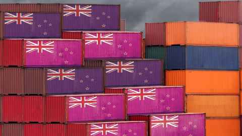 Containers stacked up, painted with the New Zealand flag, are pictured: Traditional trade is being disrupted by new technologies. Photo:iStock