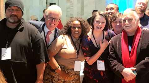 Professor Peter O'Connor and the production team of the play "That's What Friends are For" smiling and celebrating..