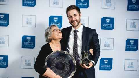 Riley Phillips-Harris and his mother Suzanne, both holding trophies