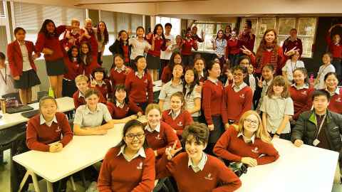 Engineering student volunteers with Year 9 and 10 students at Westlake Girls High School