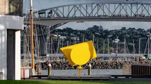 The "Rainbow Machine", a large bright yellow cone on the waterfront.