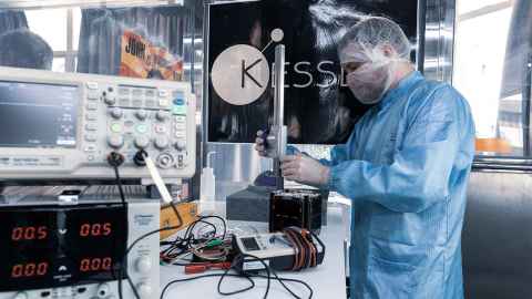 Aiming high: A student works on a CubeSat in the Auckland Programme for Space Systems (APSS) lab. 