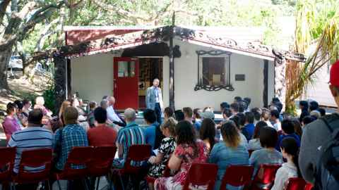 Associate Professor Mark Barrow standing in front of a group of seated students