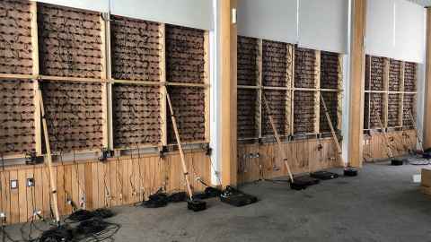 Cables attached to a wooden frame.