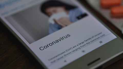 A phone screen showing a web page about coronavirus