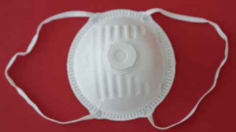 A white N95 respirator mask.