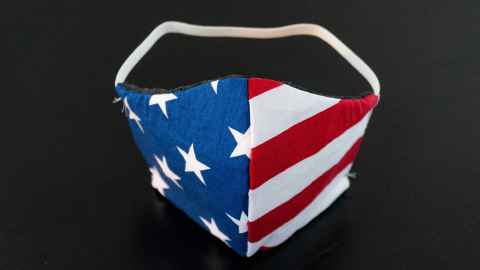 A cloth mask with an American flag pattern.