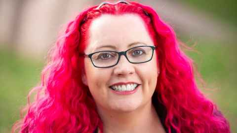 Dr Siouxsie Wiles has pink hair.