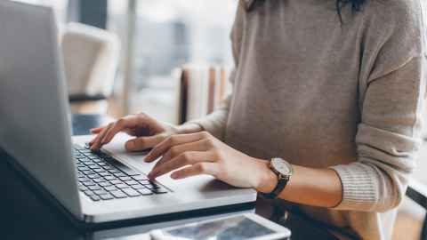 Person working on a laptop
