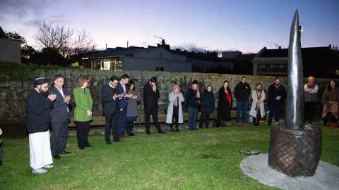 Guests at the dawn blessing for  the unveiling of the memorial 