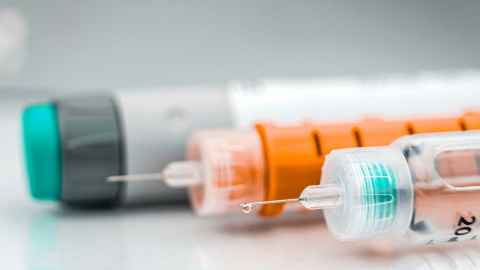 Syringes lying on a table.