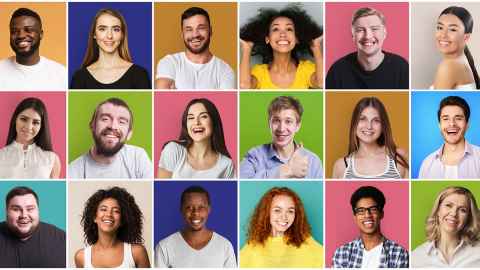 The image shows individual photos of the smiling faces of young adults in their 20s of different ethnicities in rows. Photo: iStock
