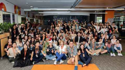A large group of people in CIE's Unleash Space.