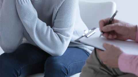 The image shows a young woman talking to a therapist who is taking notes: One of the more fiercely debated points in abortion law reforms related to ‘sex-selective abortion’ or the termination of female foetuses. Photo: iStock