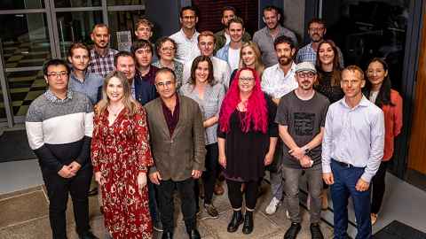 A group of smiling people.