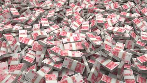 The image shows piles of Chinese currency bank notes: Gross merchandise value (GMV) of sales on Singles Day 2020 surpassed 372.3 billion yuan ($56.42 billion). Photo: iStock