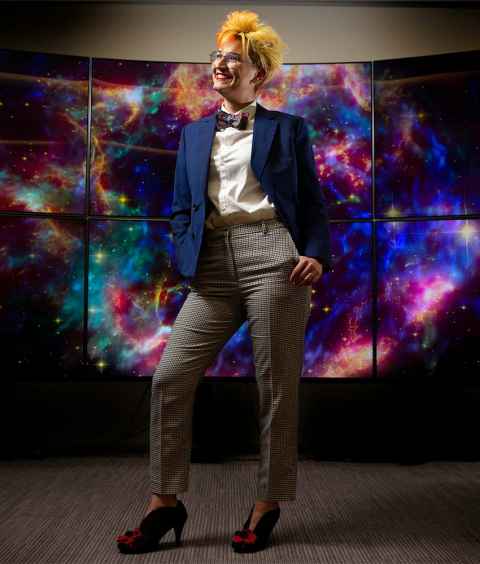Dr Heloise Stevance in front of supernova Cassiopeia.