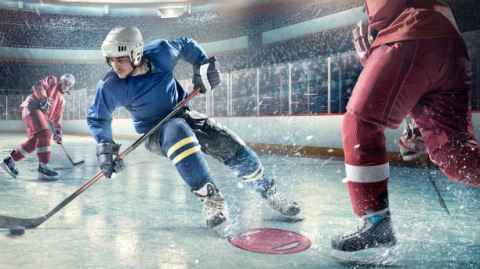 People playing ice hockey.