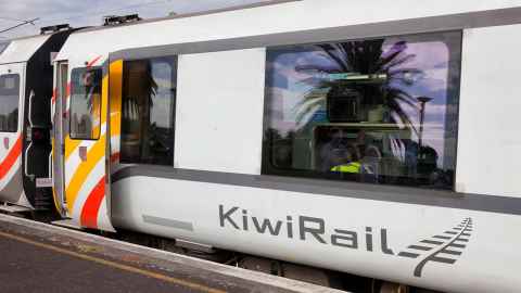 The image show a close-up photo of a KiwiRail train at a station: The long-term nature of the Government’s commitment to rail is transformative for KiwiRail as a business. Photo: iStock
