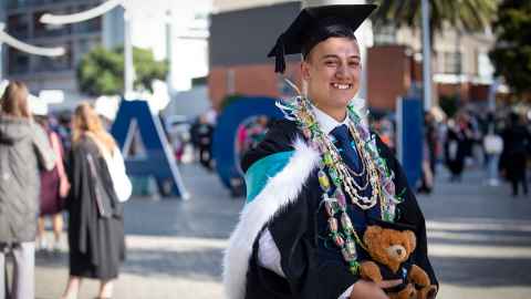 Callum Tokorangi in academic regalia.