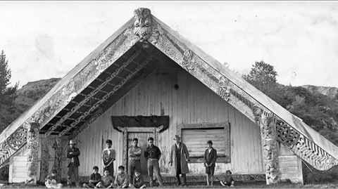 A black and white photo of a wharenui.