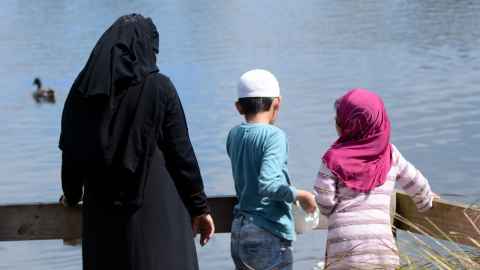 A refugee family enjoying an Auckland park.