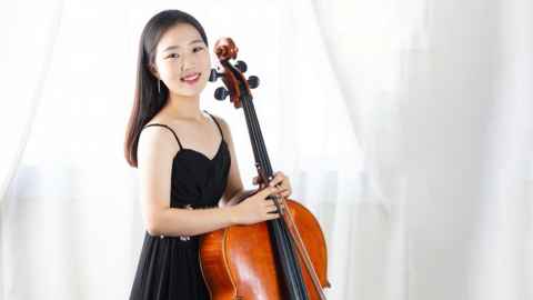A young woman with a cello.
