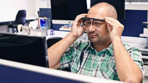 Dr Jason Turuwhenua wearing a headset.