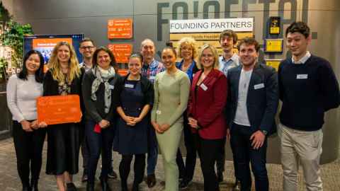 A large group of smiling people.