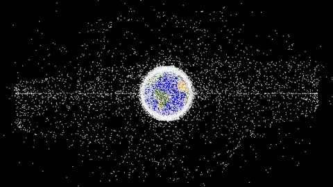 The Earth surrounded by space covered in white dots.