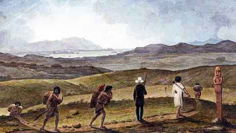 A painting showing people walking over hills with the sea in the distance.