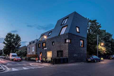 The corner of Costa Street and McDermott Road, in Peckham, London. The houses are numbered 23, 25, 27 and 29 Costa rather than as flats A, B, C and D.