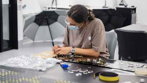 Mya Dixon, a second-year Architecture student, working on the artwork. 