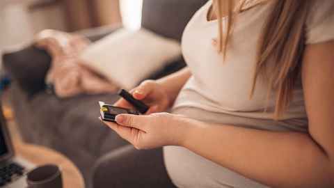 A pregnant woman.