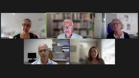 A screenshot from an online meeting, with five people shown.
