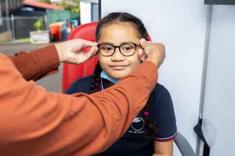 Malia Talakai at Nga Iwi School tries a pair of glasses for size. 